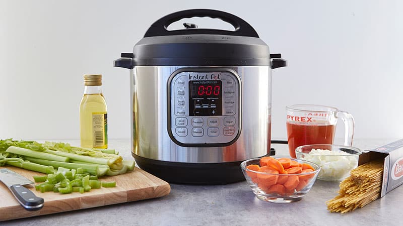 Instant Pot, celery, olive oil, spaghetti, onions, tomato sauce, carrots